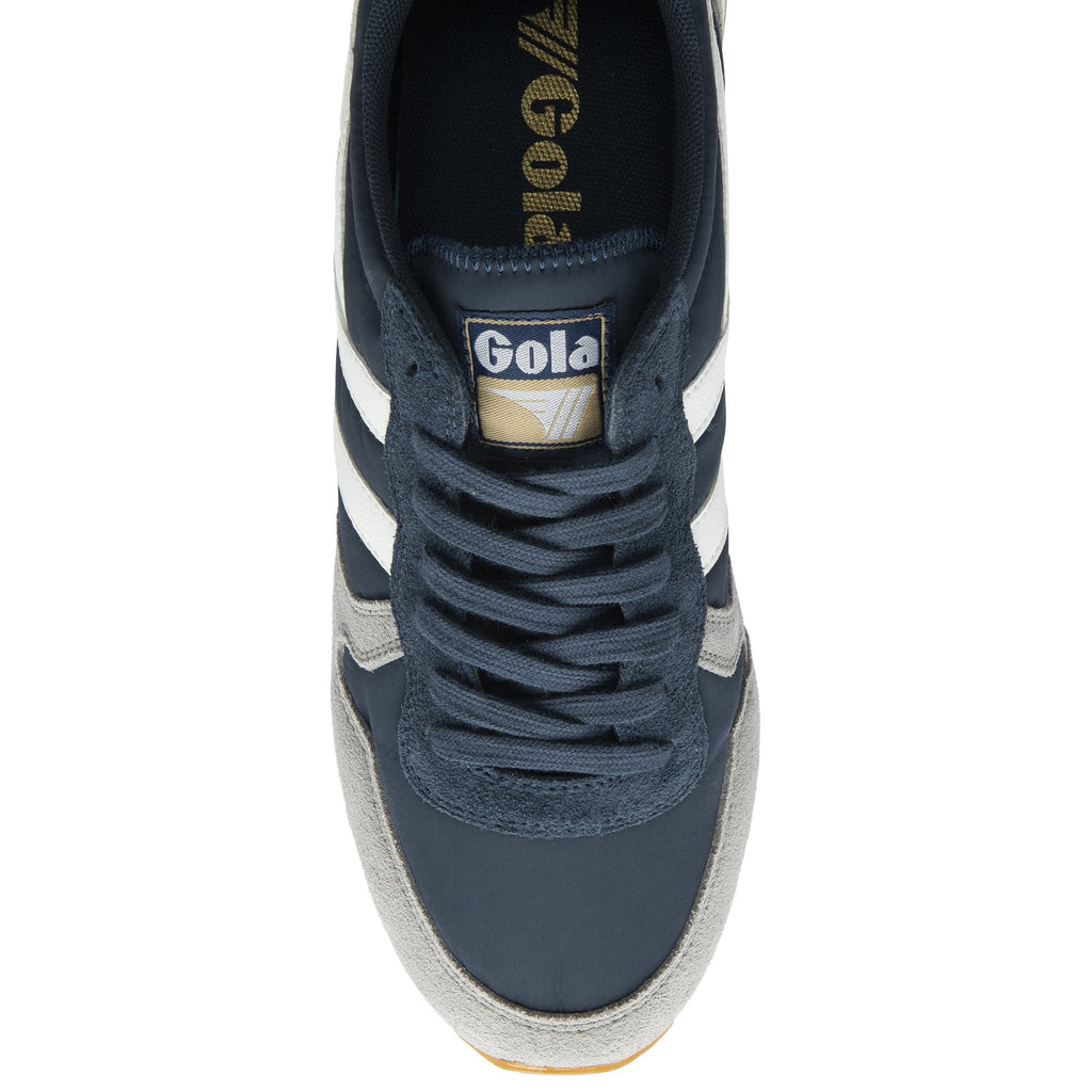 Top-down view of a Gola men's sneaker in navy and grey, focusing on the laces and tongue.