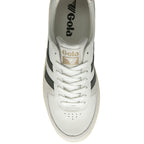 Top down view of a white Gola sneaker with dark green stripes and laces.