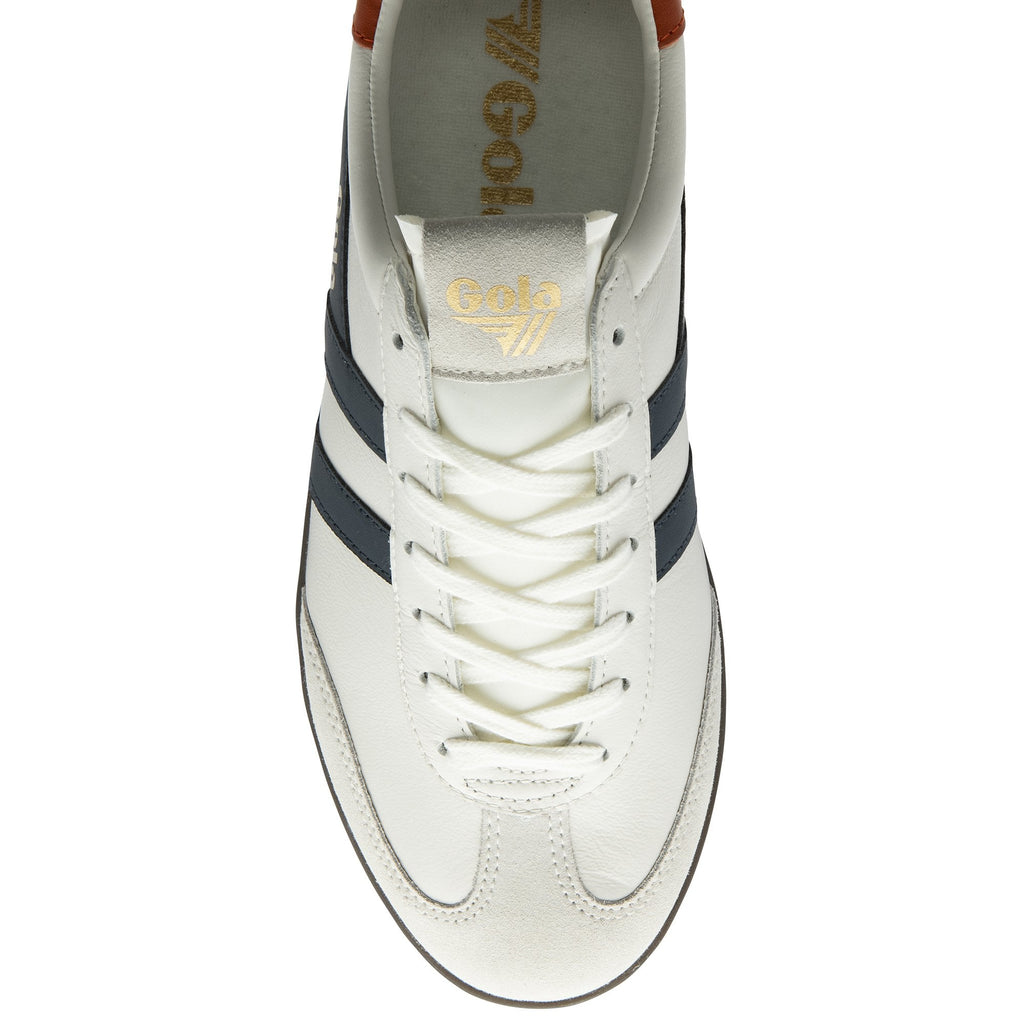 Top down view of a white Gola sneaker with navy stripes and white laces.