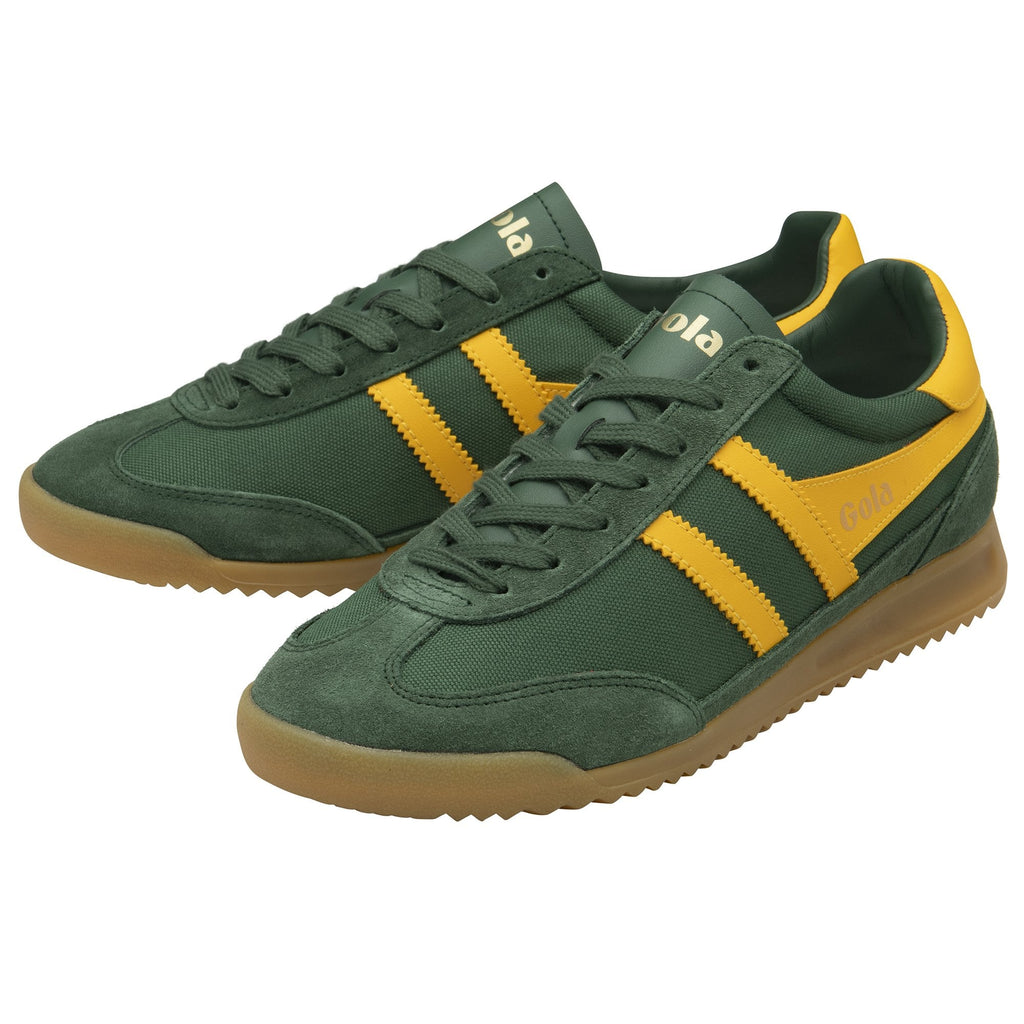 Two green Gola trainers with yellow stripes, presented side by side.