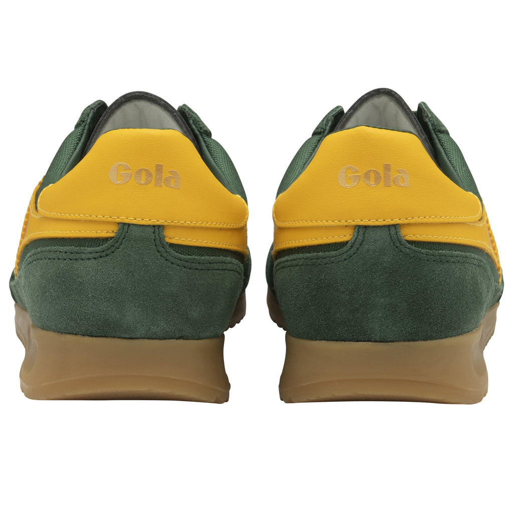 The rear view of two green Gola trainers with yellow heels.