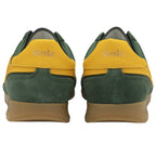 The rear view of two green Gola trainers with yellow heels.