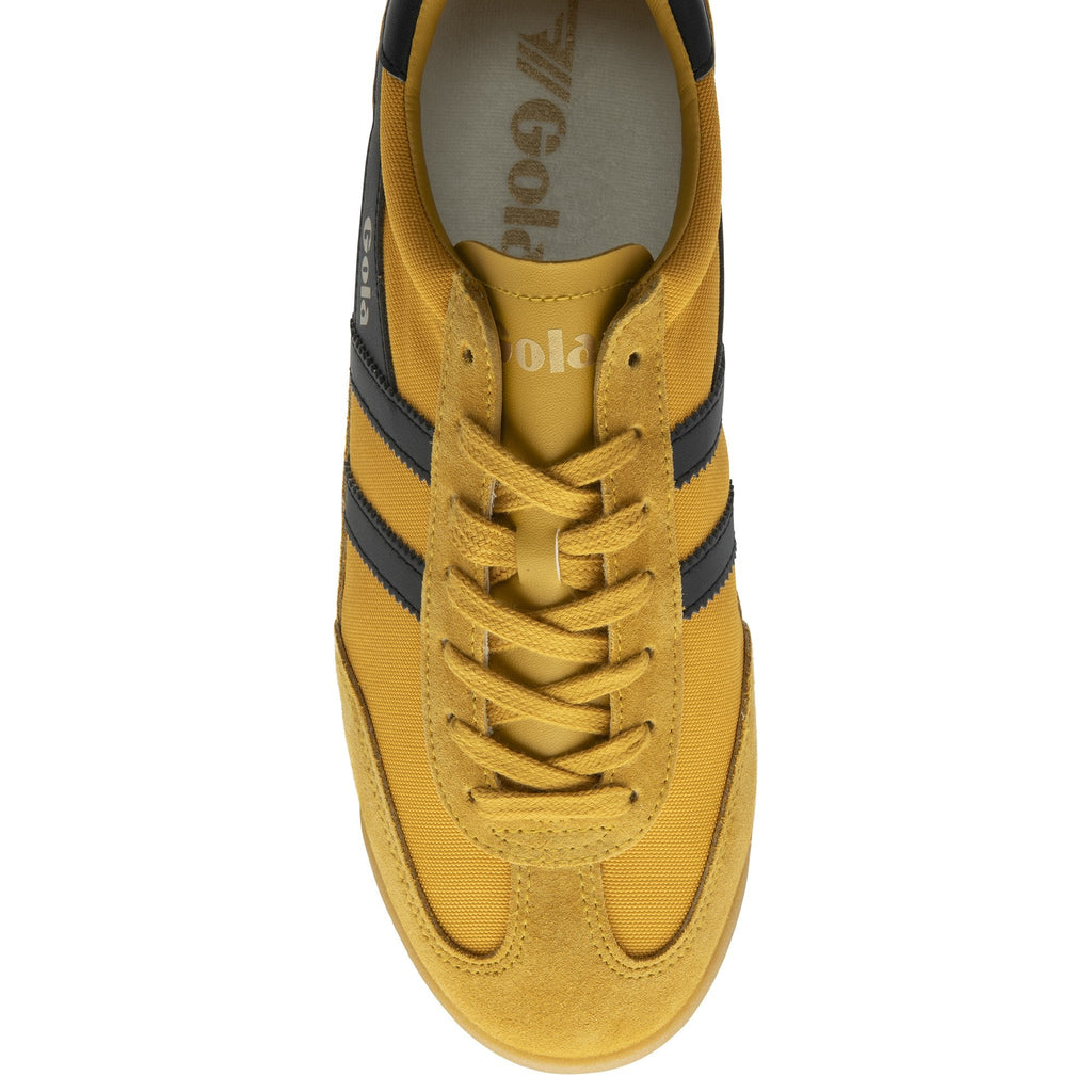 Top down view of a Gola men's trainer in mustard and black.
