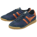 Both navy and brown casual trainers are on a white background, viewed from an elevated angle.