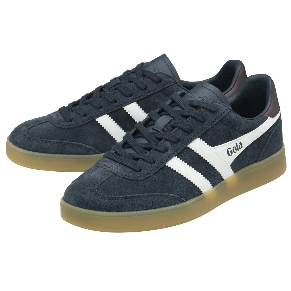 Pair of navy blue suede Gola sneakers with white stripes and gum soles