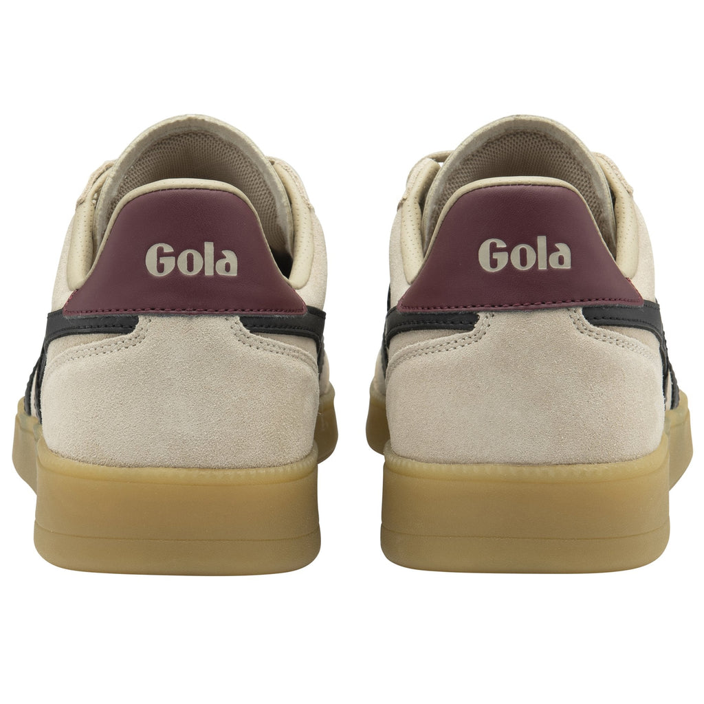 Rear view of a pair of beige Gola sneakers with dark red heel accents.