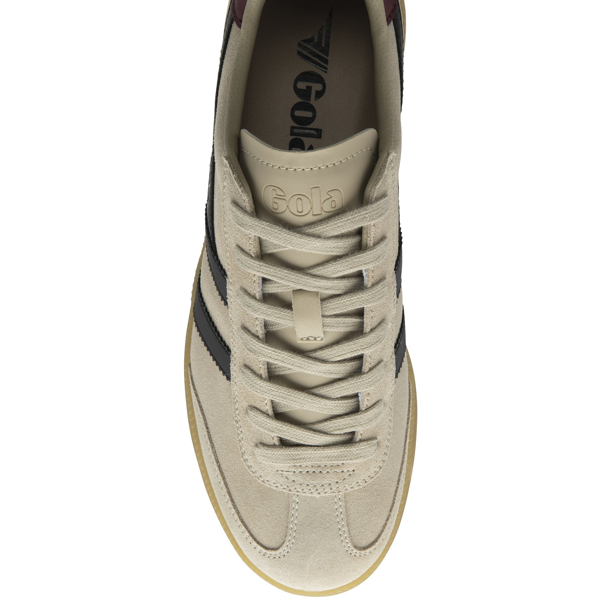 Top down view of a beige Gola sneaker with black stripes and a dark red heel accent.