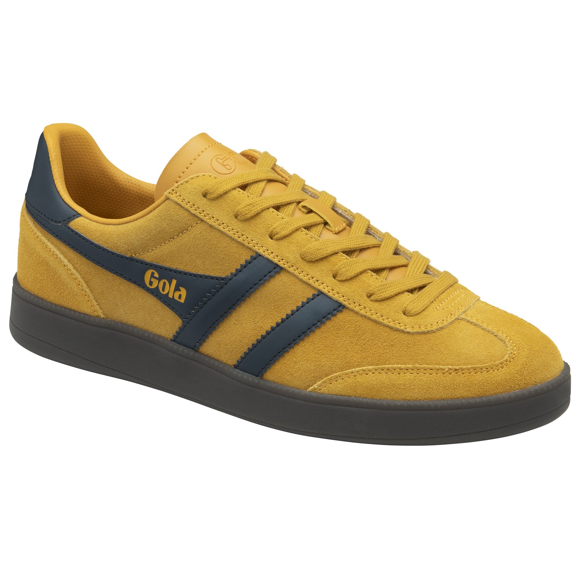 Mustard yellow Gola sneaker with dark blue stripe and logo, at an angle.
