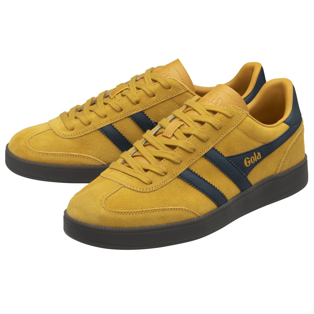 Pair of mustard yellow Gola sneakers with dark blue stripes and logos.