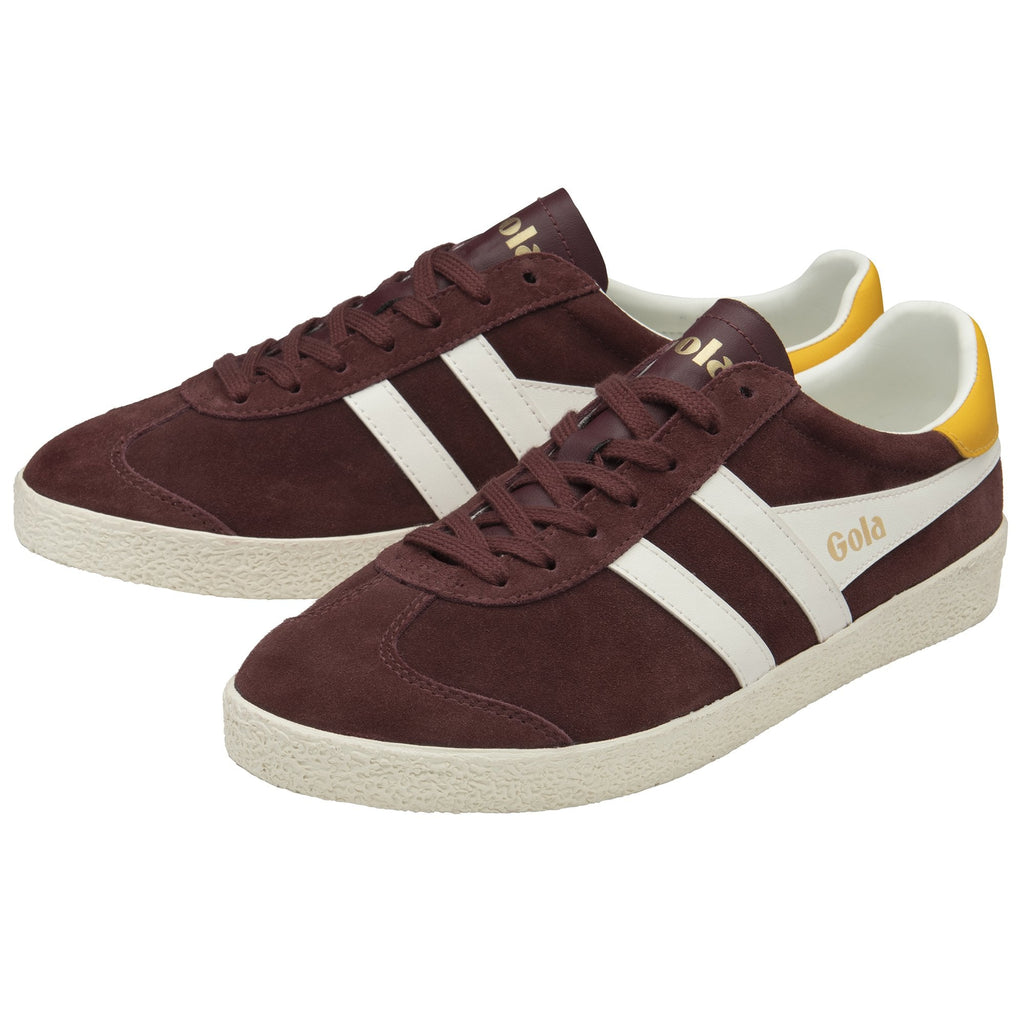 Pair of Gola Harrier trainers in maroon suede, with white stripes and yellow heel details.
