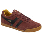 A left Gola men's Harrier Suede trainer in burgundy with black stripes and a gum sole.