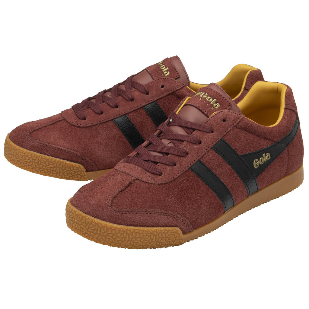 A pair of Gola men's Harrier Suede trainers in burgundy with black stripes and a gum sole.
