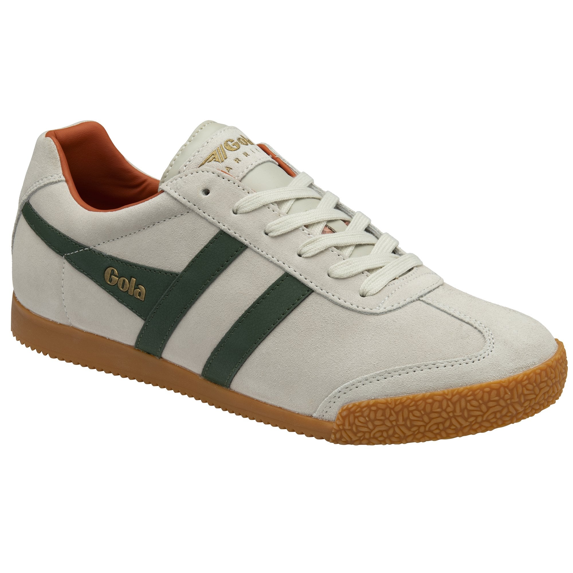 A white Gola sneaker with green stripes and a brown sole, angled to the left.