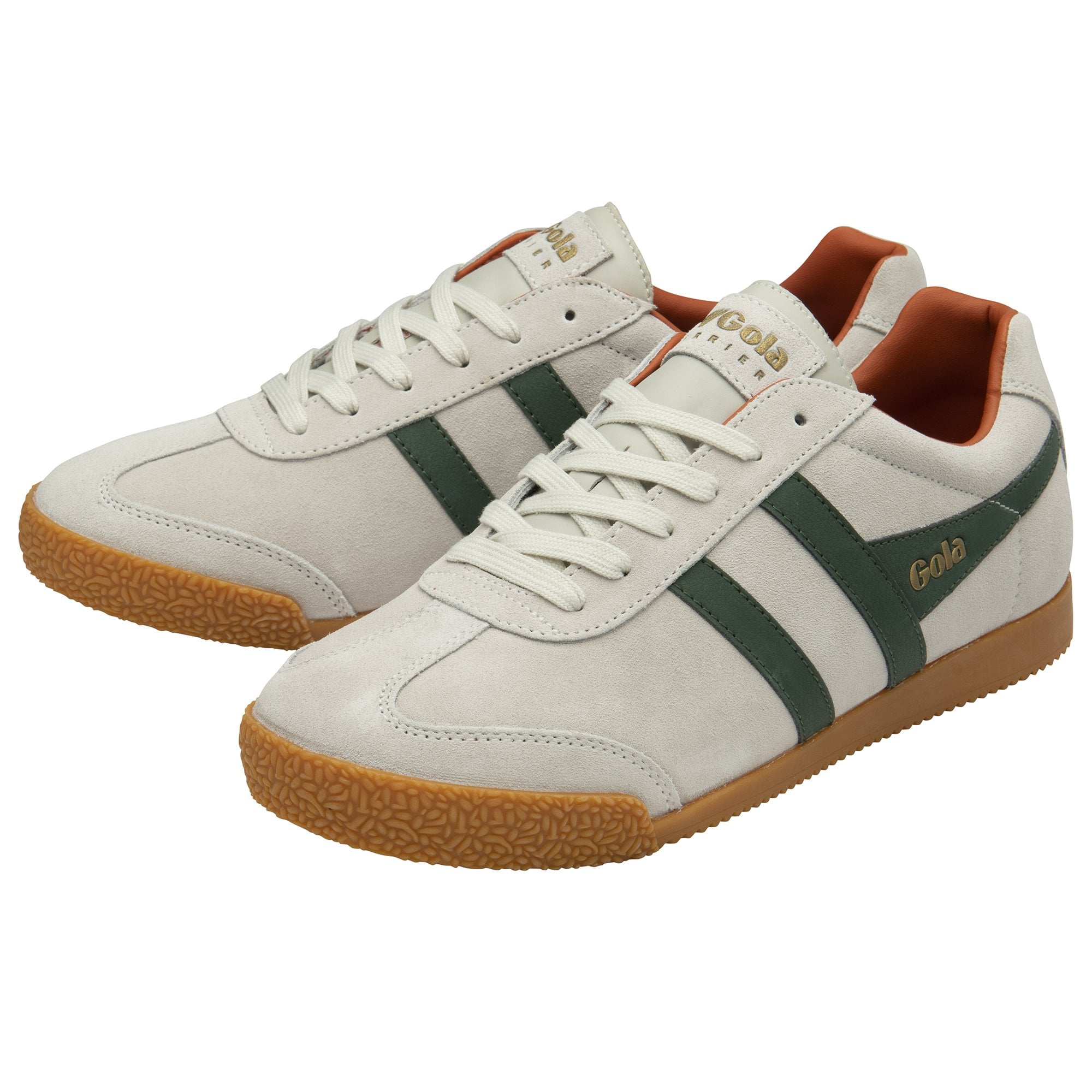 A pair of white Gola sneakers with green stripes and brown soles.