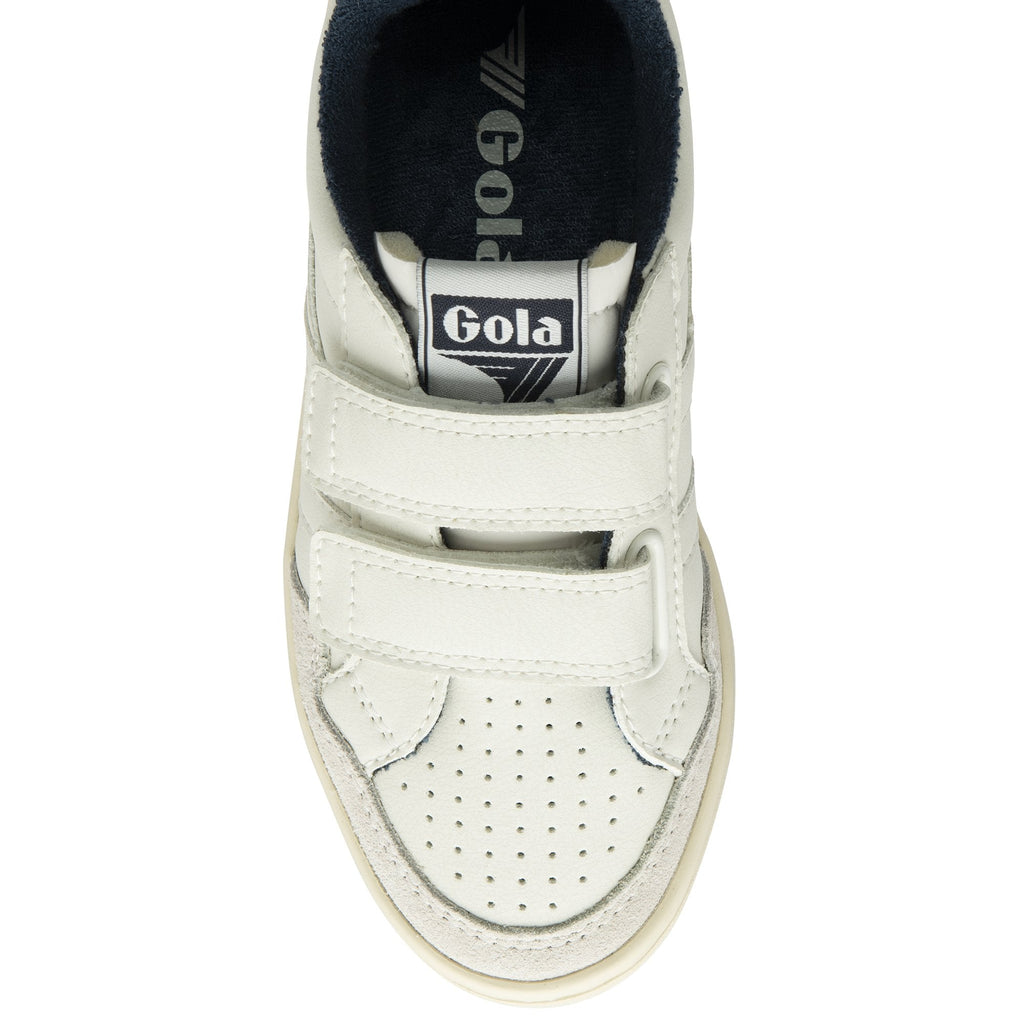 The top-down view of a white Gola children's shoe with navy accents and velcro straps.