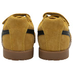 A rear-facing view of a pair of mustard yellow Gola trainers with black stripes and brown soles.