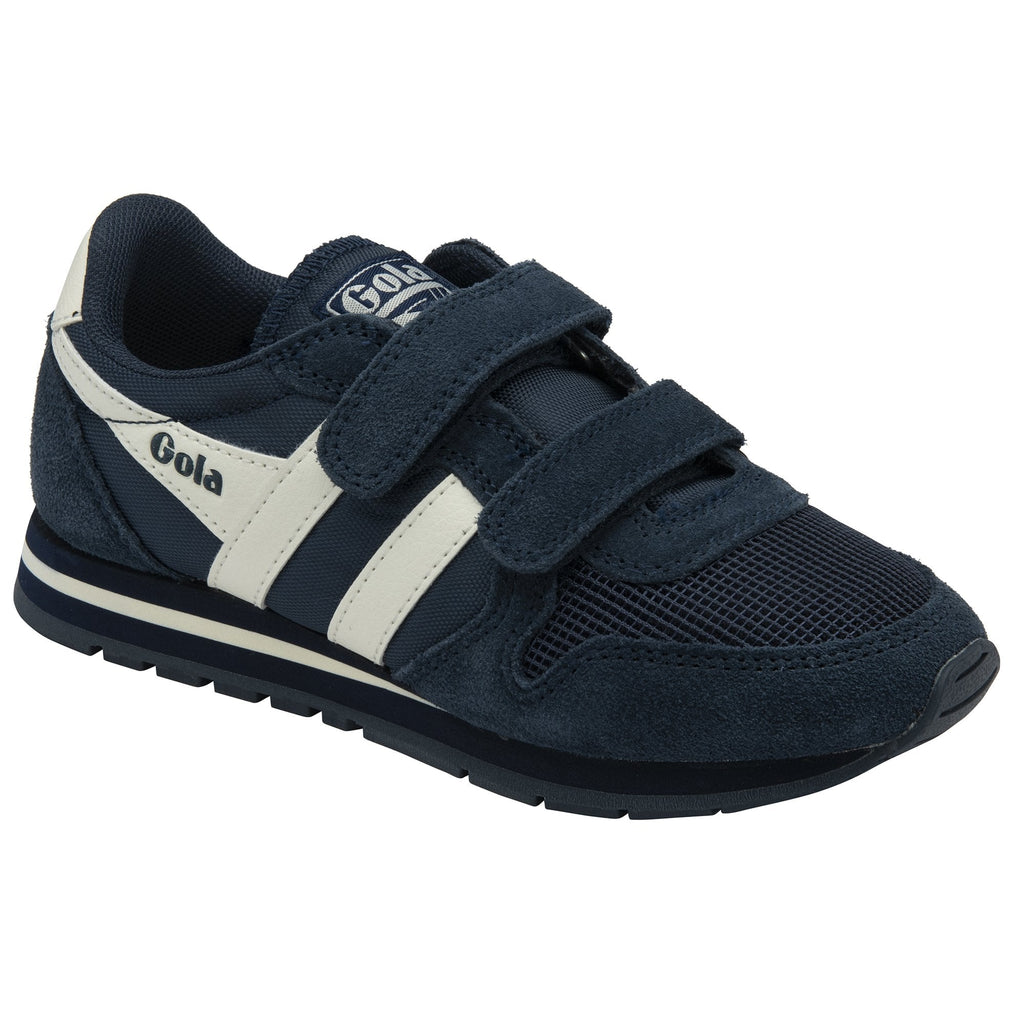 An angled side profile of a Gola Kids Harrier Strap shoe in navy blue and white, against a white background.