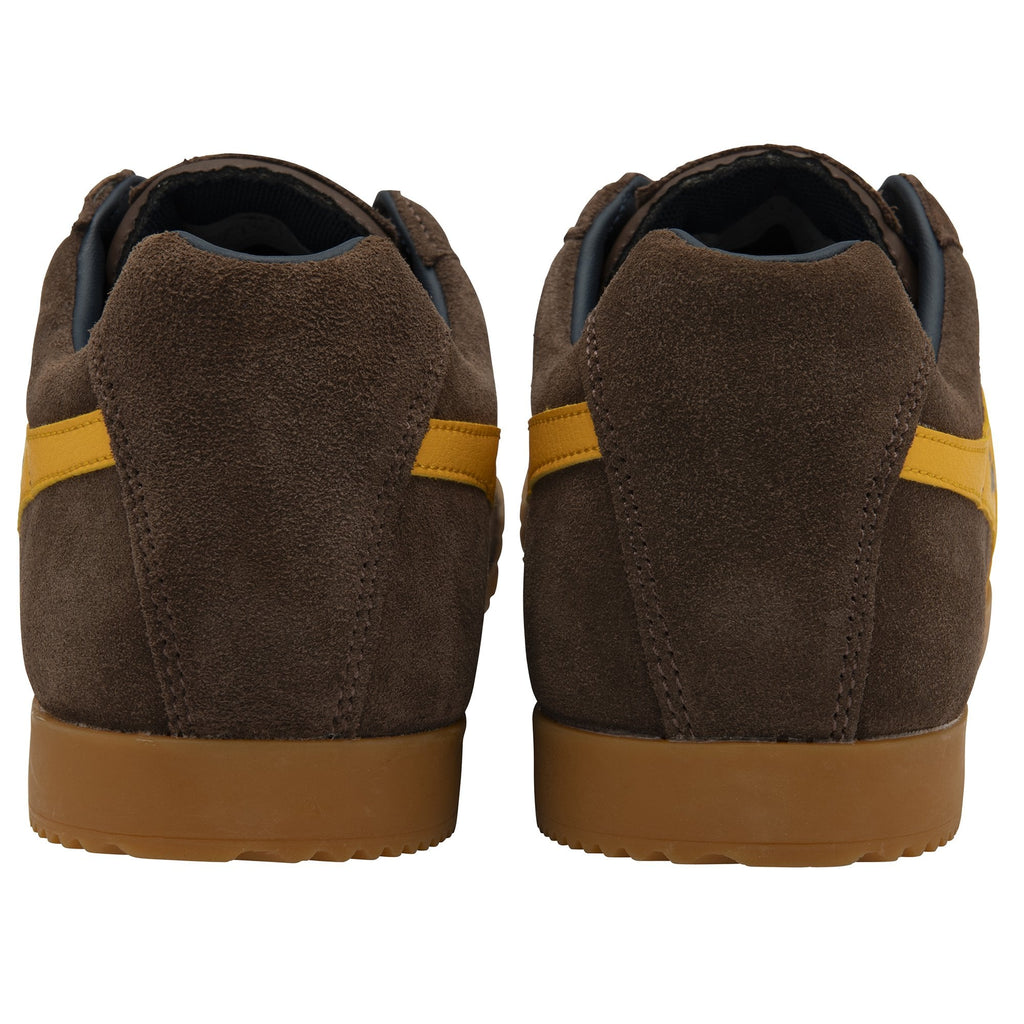 Rear view of a pair of brown Gola men's shoes with yellow accents.