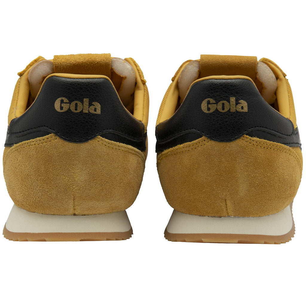 Back view of a pair of Gola Harrier trainers in sun/black/gum, focusing on the heel branding.