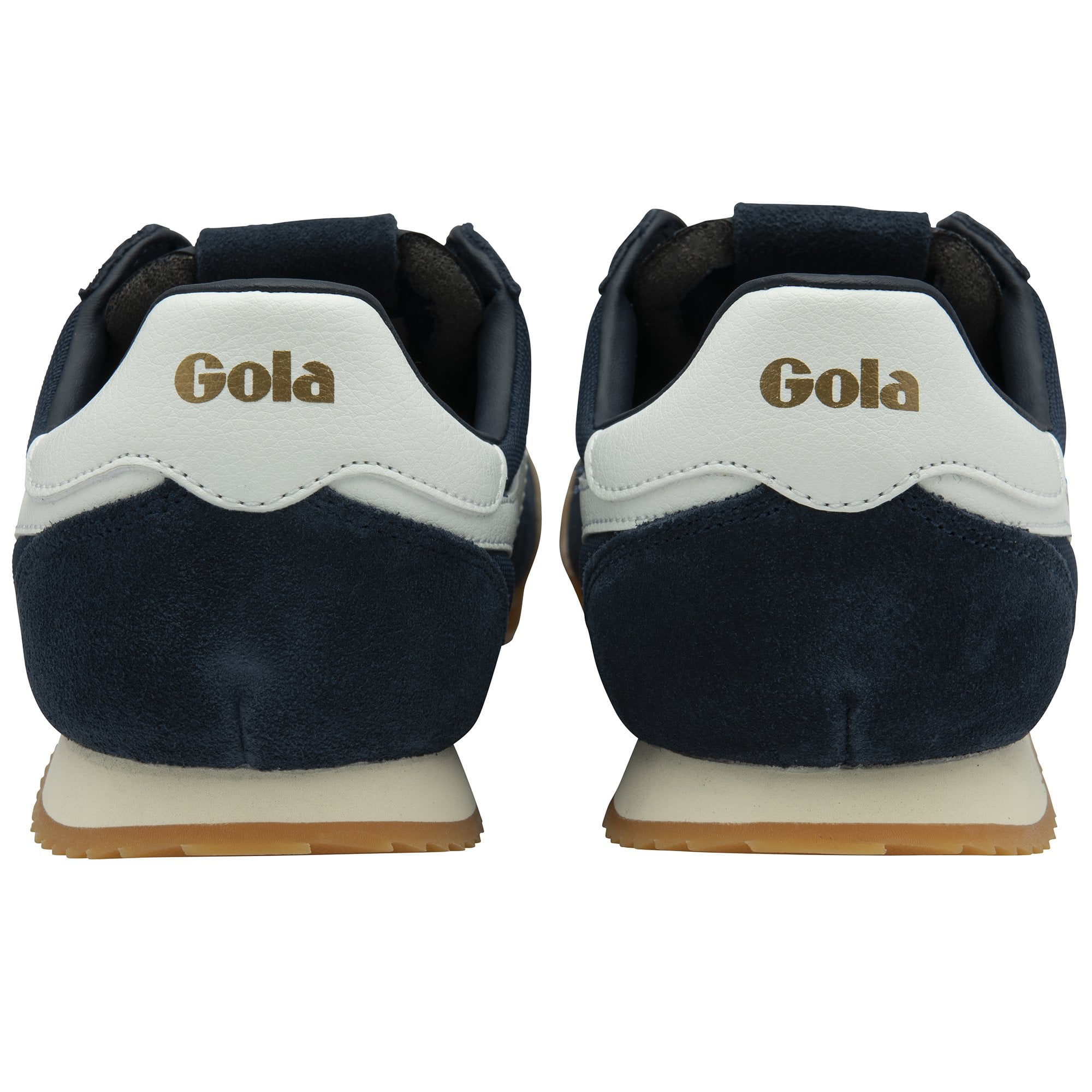 The backs of two navy blue Gola trainers with white heel tabs and gum soles.