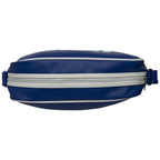 Top view of a blue Gola satchel showing the zipper closure and white stripes.
