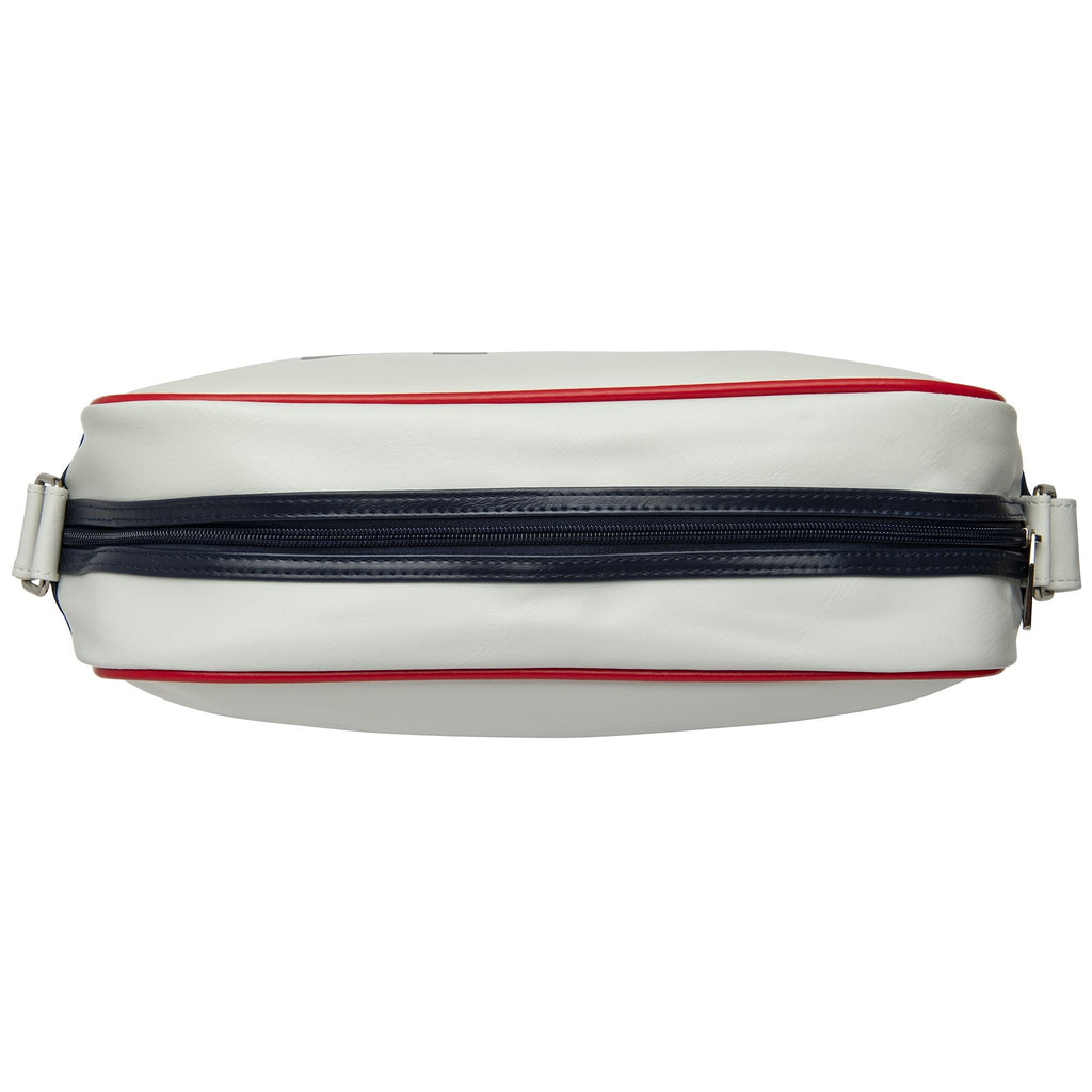 White Gola messenger bag with navy stripe and red piping, top view.