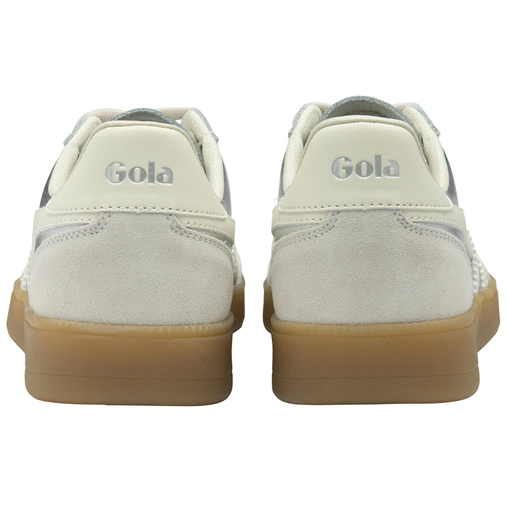 The back view of two Gola sneakers, showing the white heel with the Gola logo and gum soles.