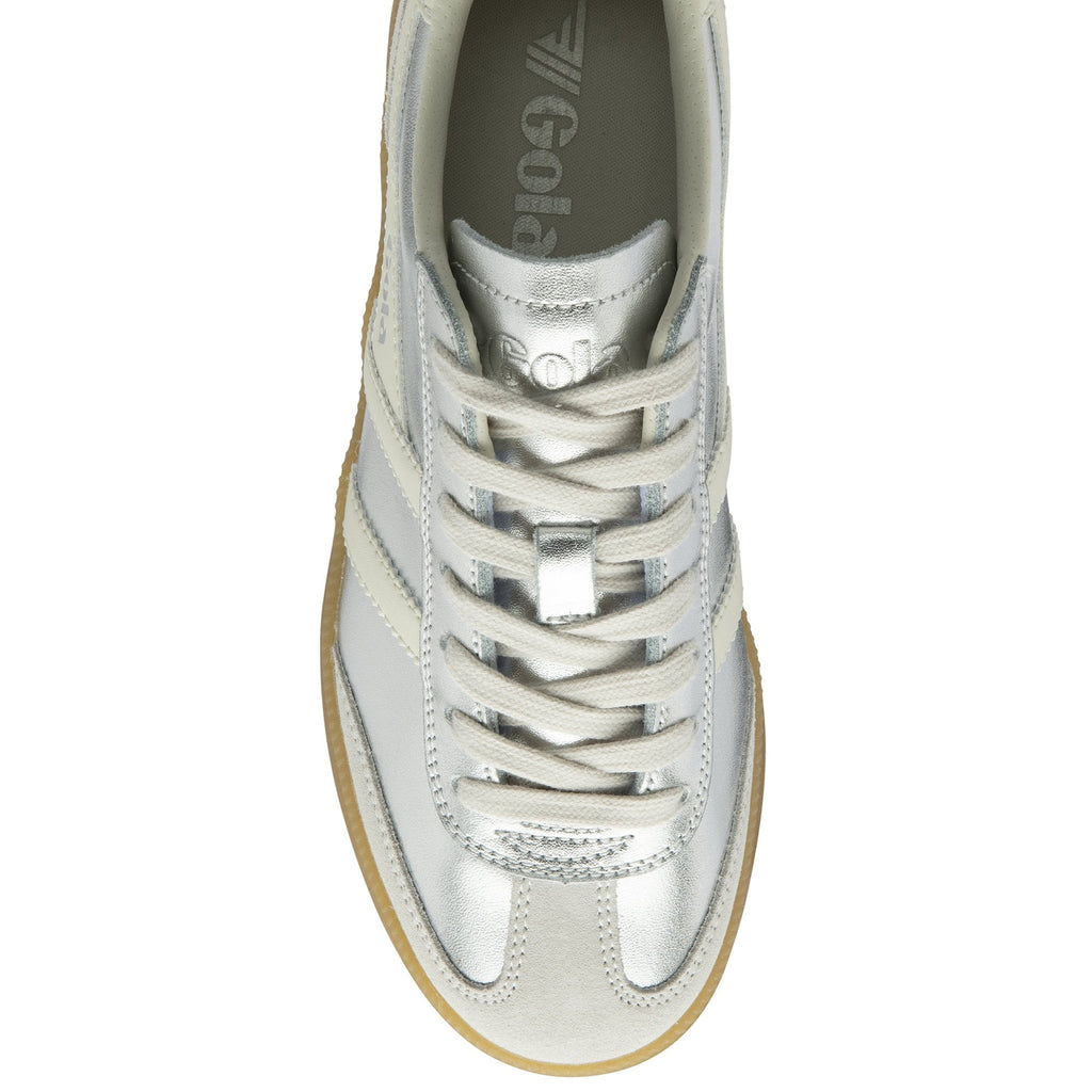 Top-down view of a silver Gola sneaker, highlighting the white laces and Gola logo on the tongue.