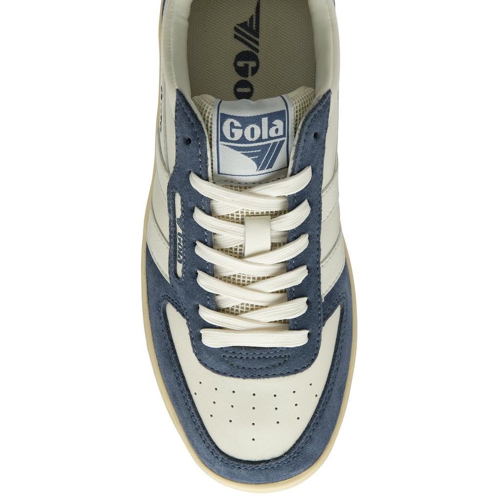 Top-down view of a single Gola low-top sneaker in off-white and blue suede.