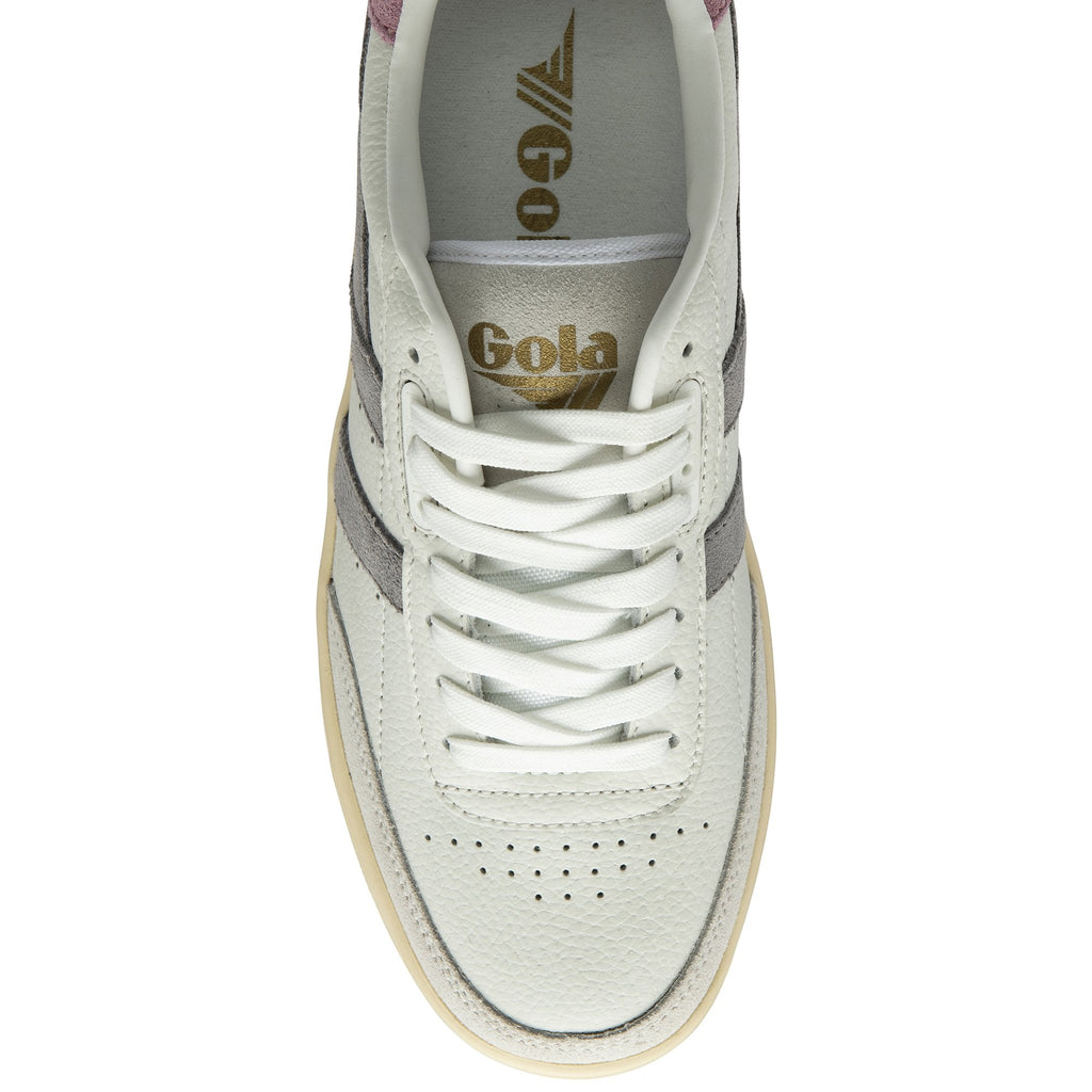 Top-down view of a white Gola sneaker with grey stripes and gold branding