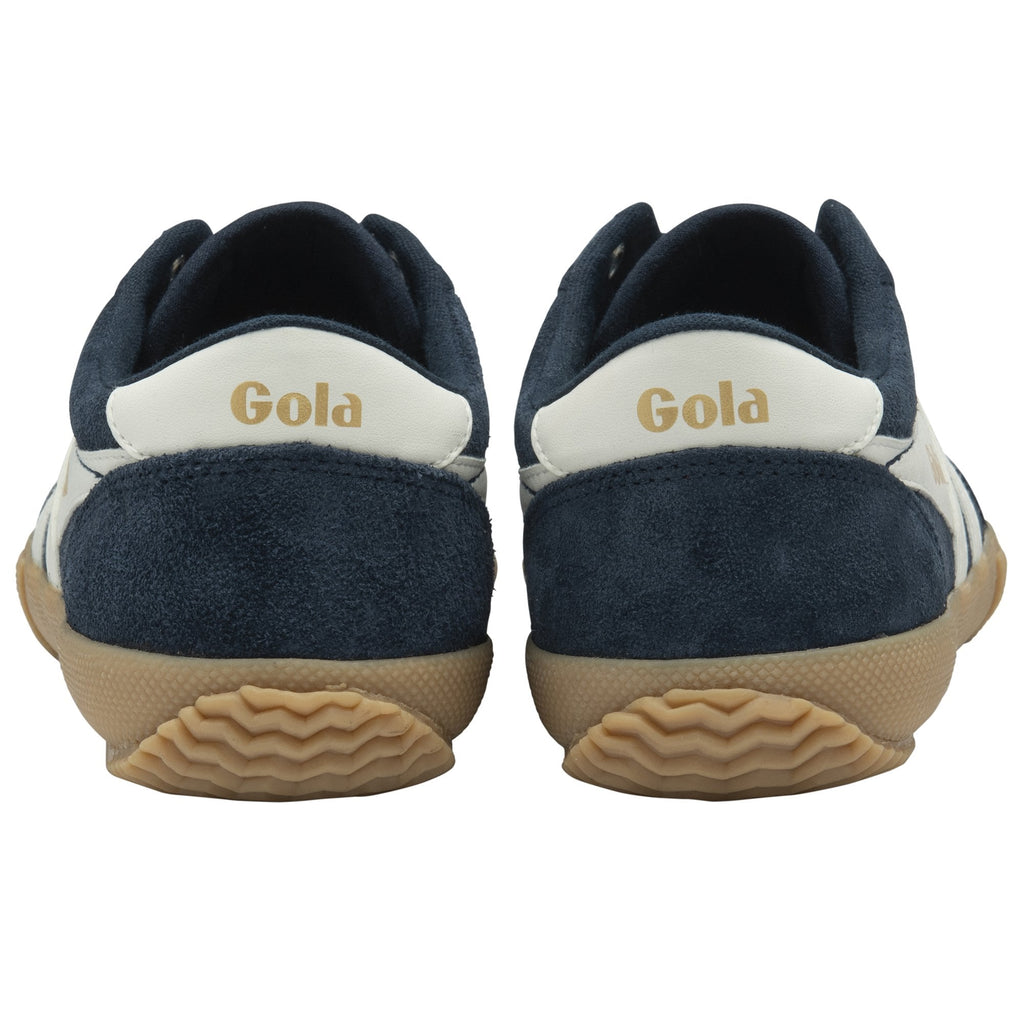 The back of a pair of navy and off-white Gola men's sneakers with gum soles.