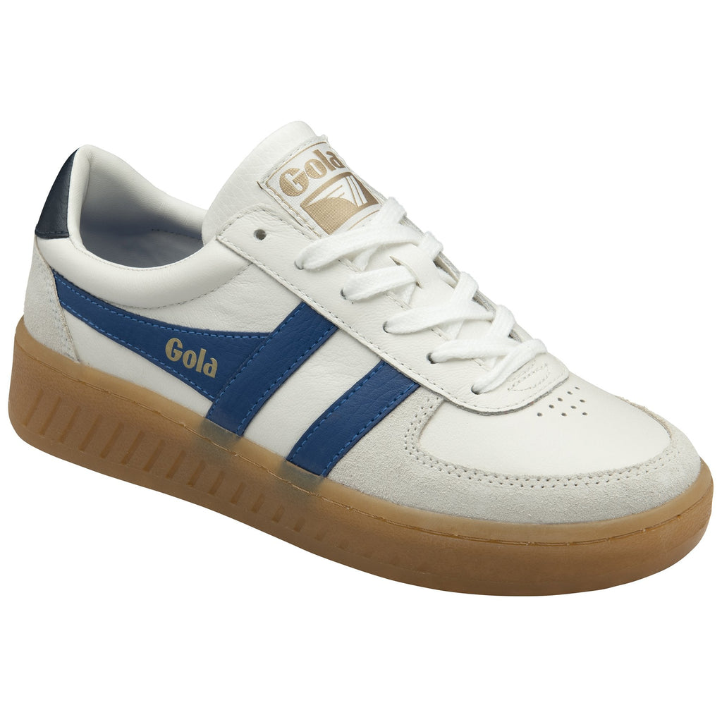 A white Gola sneaker with blue stripes and a brown sole, angled side view.