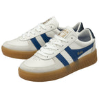 A pair of white Gola sneakers with blue stripes and brown soles, angled view.