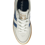 Overhead view of a white Gola sneaker with blue stripes and a brown sole.