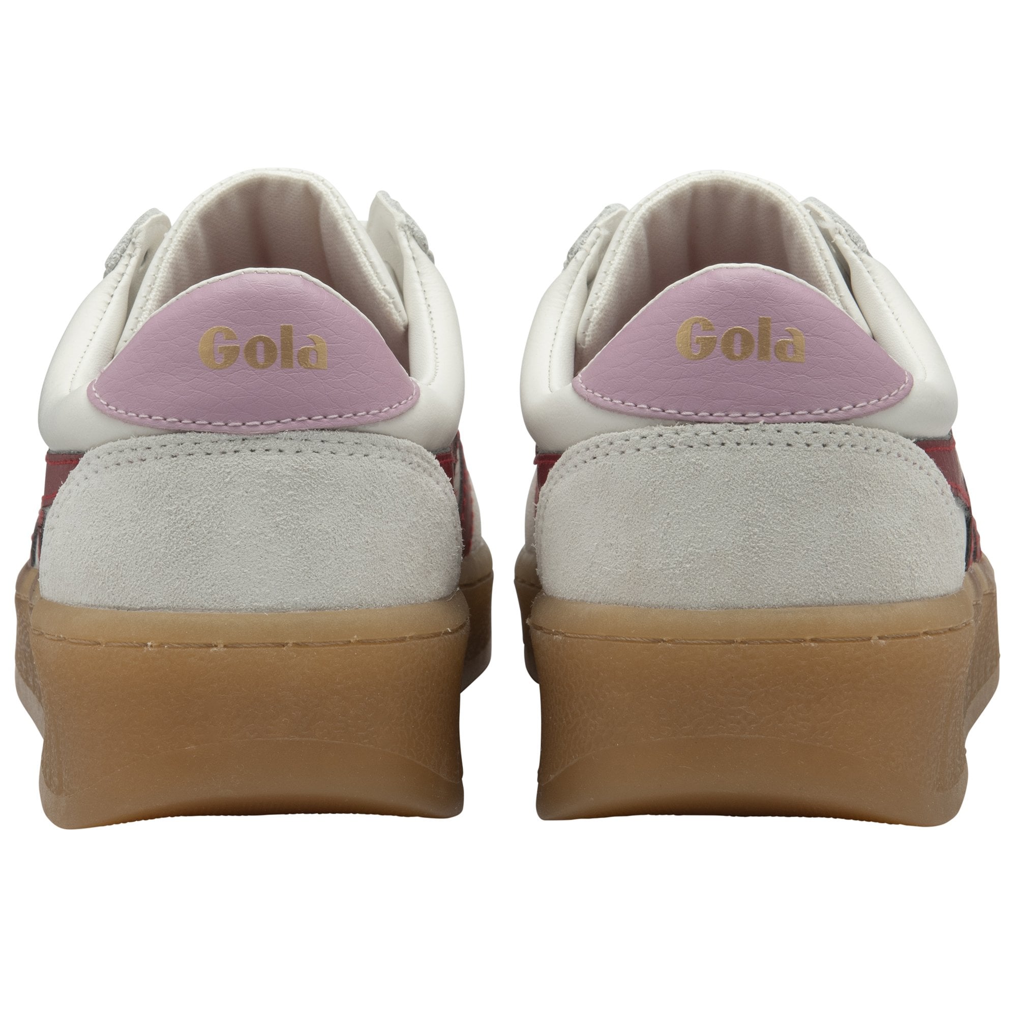 Rear view of a pair of white Gola sneakers with pink heel tabs and gum soles.