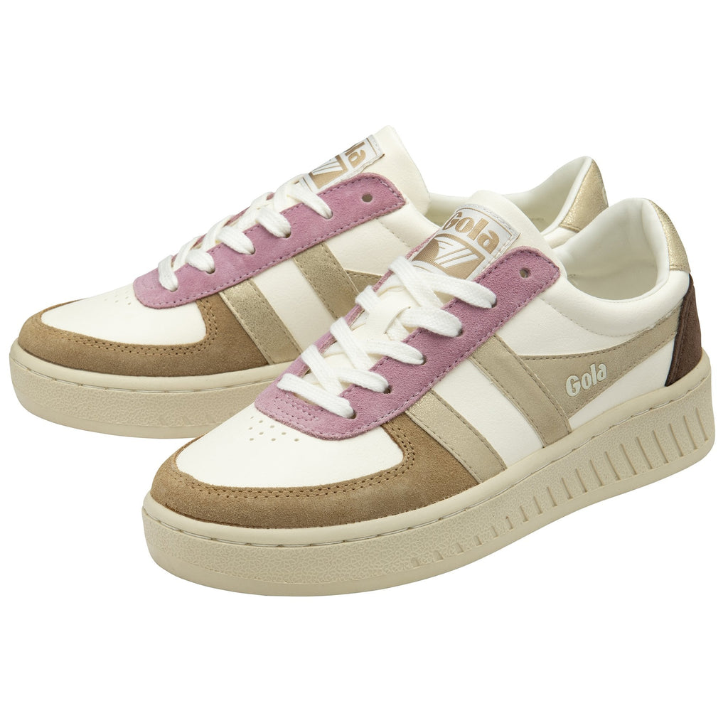 A pair of white Gola sneakers with gold, brown, and pink accents.