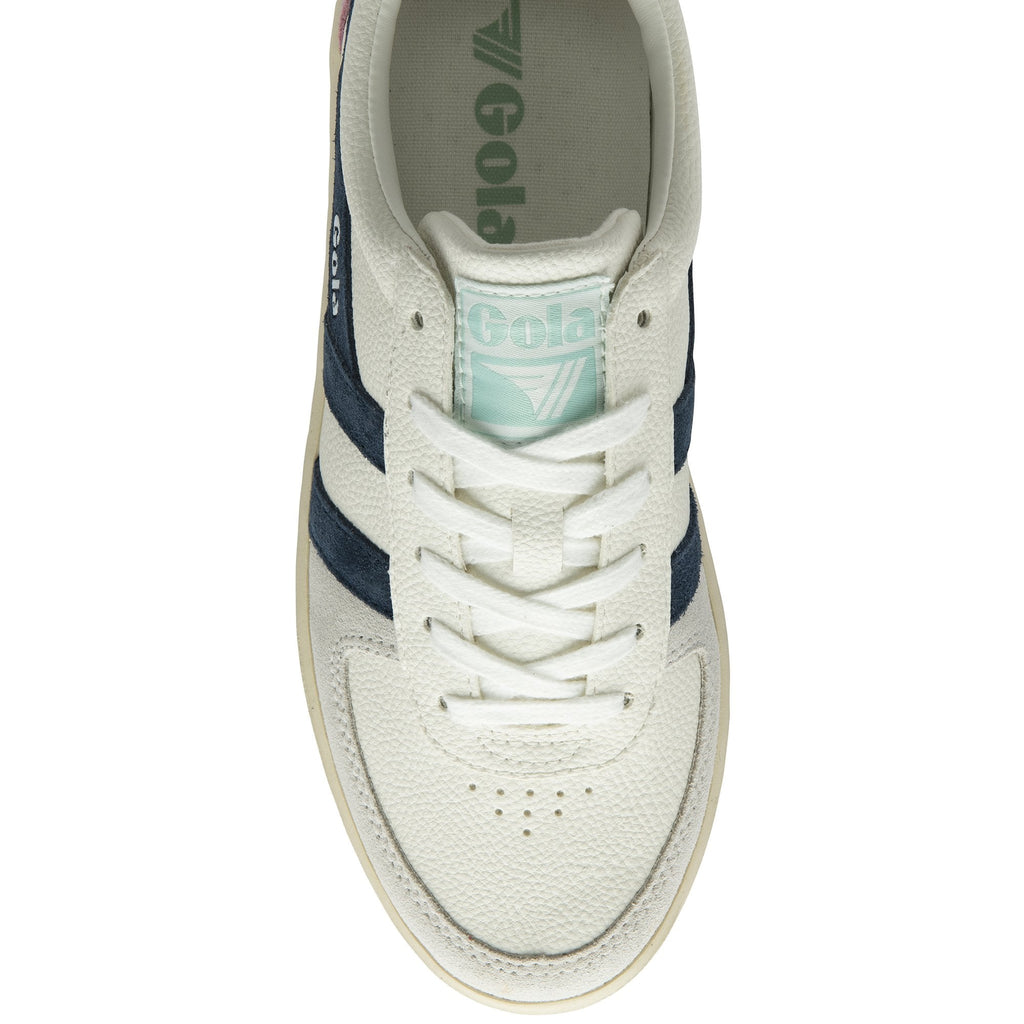 Top down view of a white Gola trainer with navy stripes.