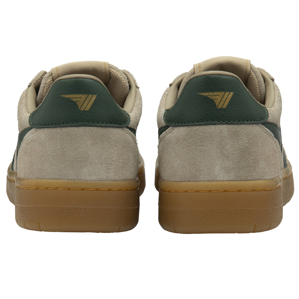 The back view of a pair of Gola low-top sneakers in beige with green heel accents.
