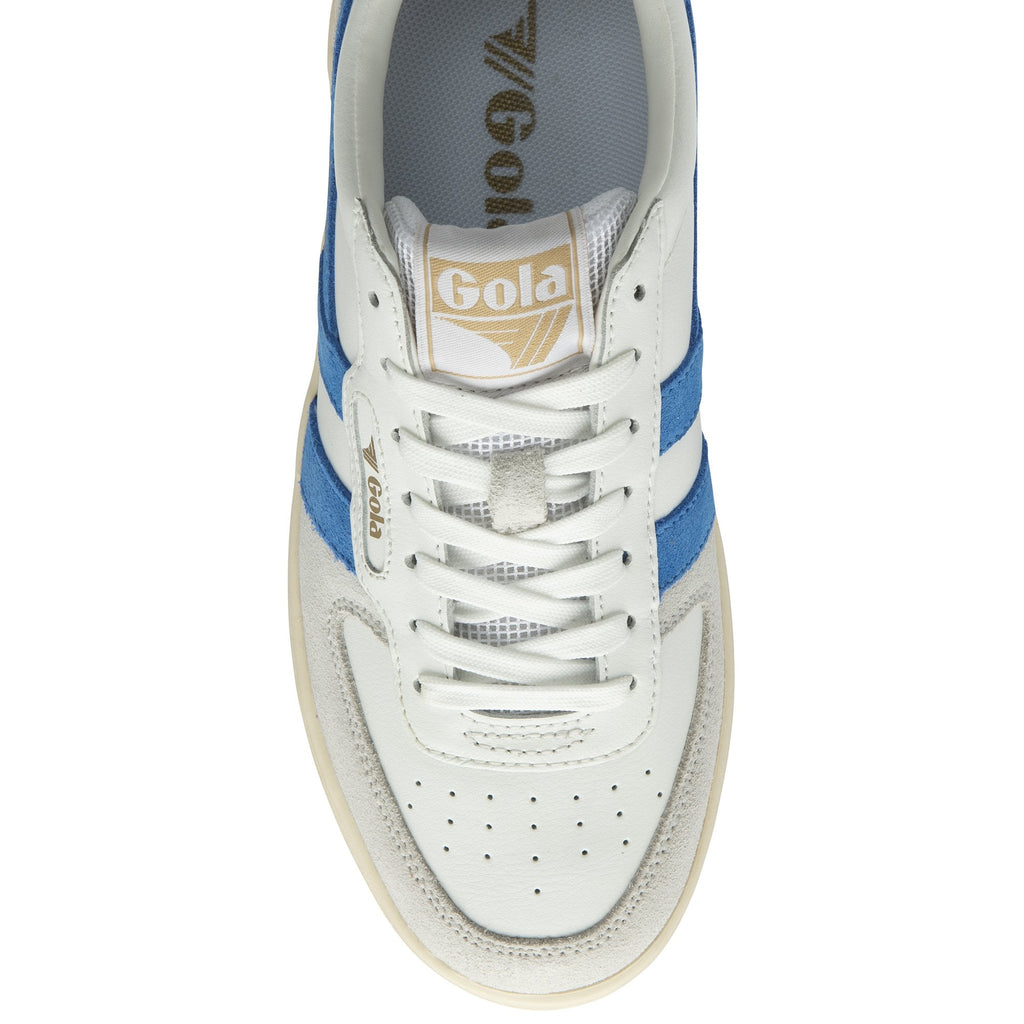 The top-down view of a white Gola sneaker with blue stripes and white laces.