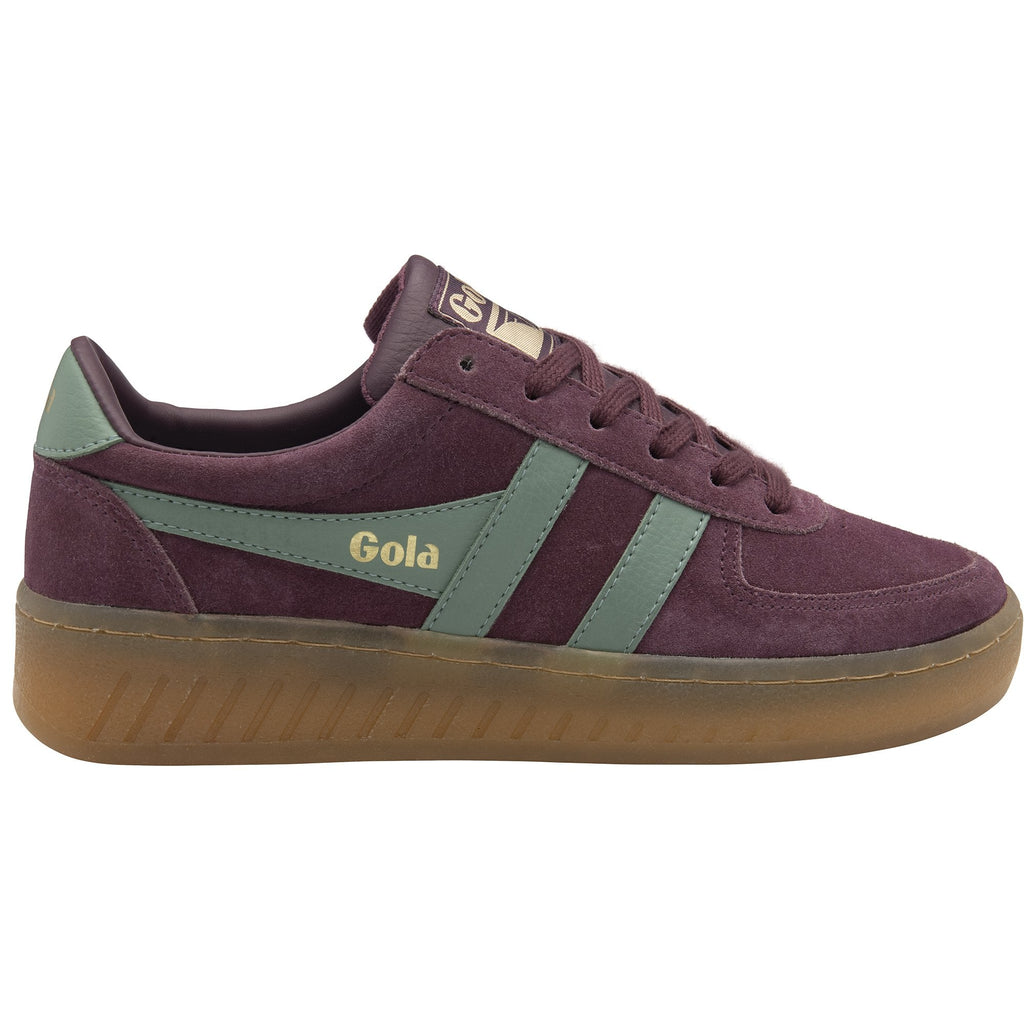 A single Gola low-top sneaker in burgundy with sage green stripes, side profile, brown sole.