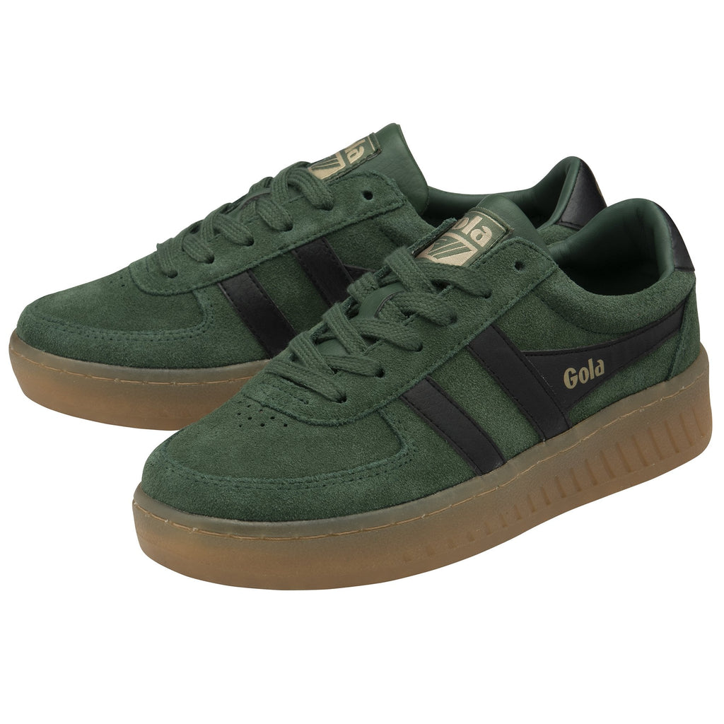 A pair of dark green Gola sneakers with brown soles and black stripes, viewed from an angle.