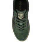 A top-down view of a dark green Gola sneaker, highlighting the laces and tongue logo.