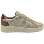 Side profile of a gold metallic and beige Gola sneaker with a red heel detail.