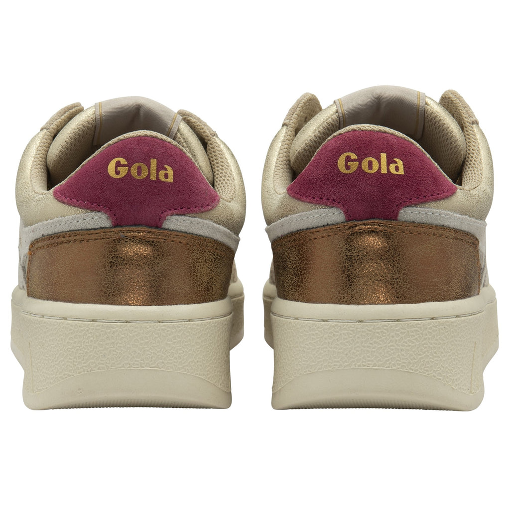 Rear view of two Gola sneakers showcasing red and bronze heel accents.