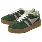 Pair of green and pink sneakers with thick brown soles, angled view.