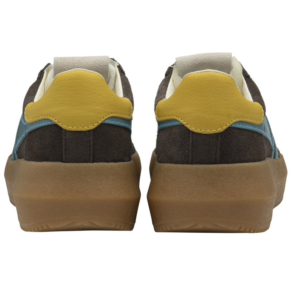 Back view of a pair of brown Gola low-top sneakers with yellow heel accents.