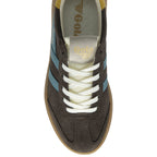 Top-down view of a single brown Gola low-top sneaker with blue stripes and white laces.