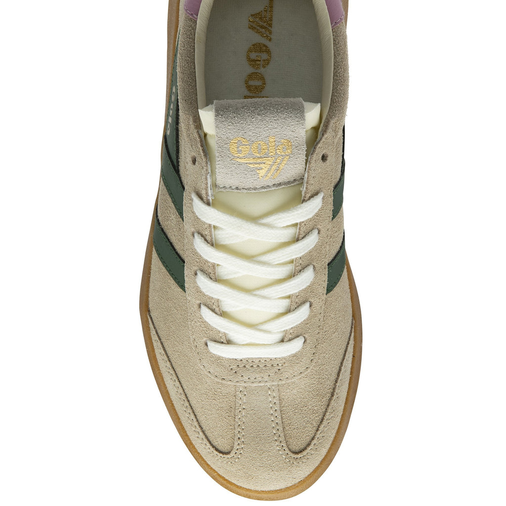 Top down view of a sand-colored Gola sneaker with green stripes and white laces.