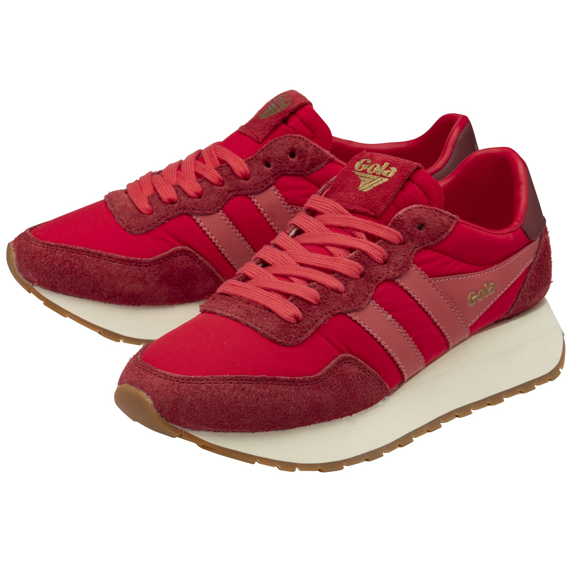 A pair of bright red Gola sneakers, with white soles and contrasting red suede details.