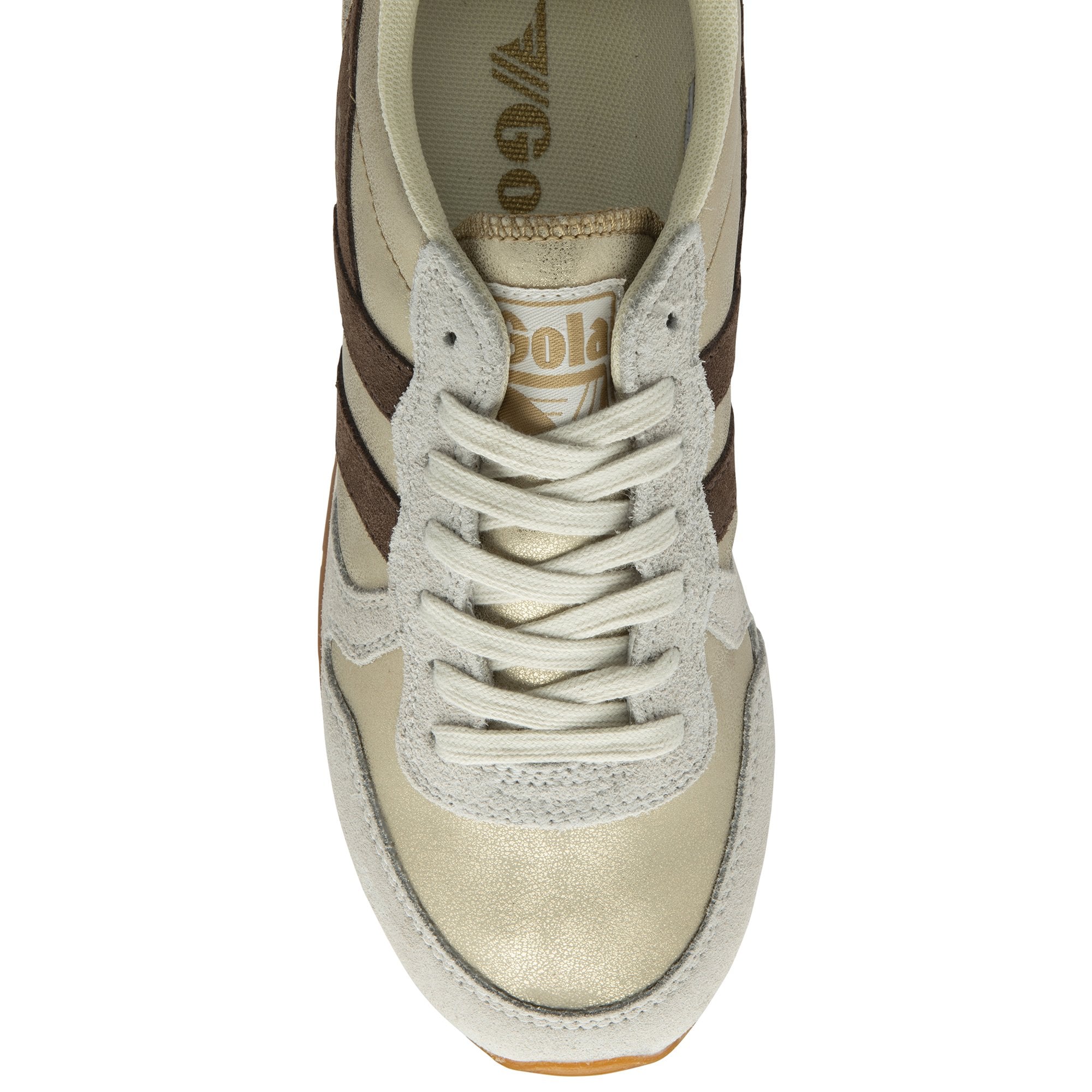 A close-up of the top of a women's Gola sneaker in cream, tan, and dark brown.